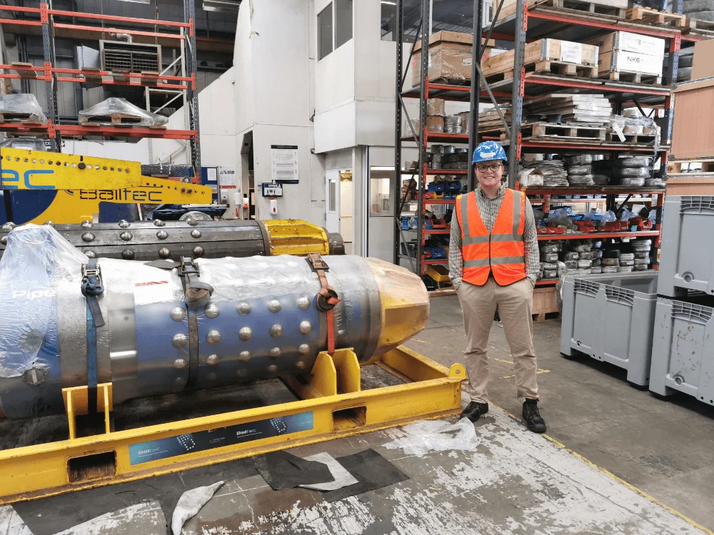 Intern Jack Clark stood outside next to a Balltec lifting tool