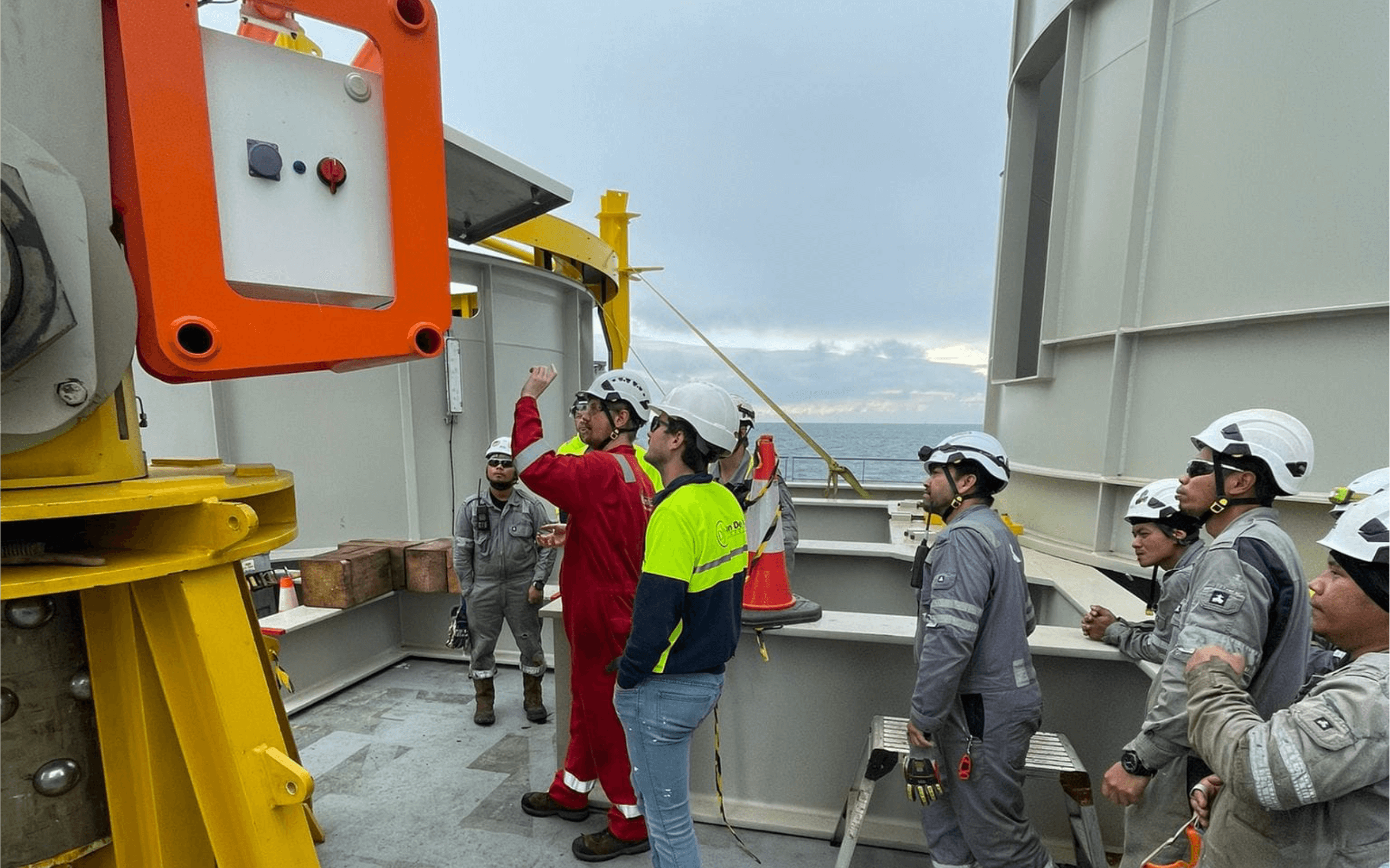 Balltec technician briefing vessel technicians on LiftLOK tool